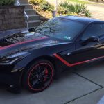 2014 Chevy Corvette with red RimBlades wheel rim protectors